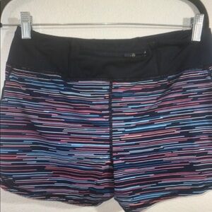 Athleta Running workout shorts size medium striped
